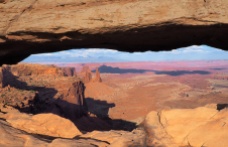 Mesa Arch, Canyonlands, with a view of the La Sal Mountains.